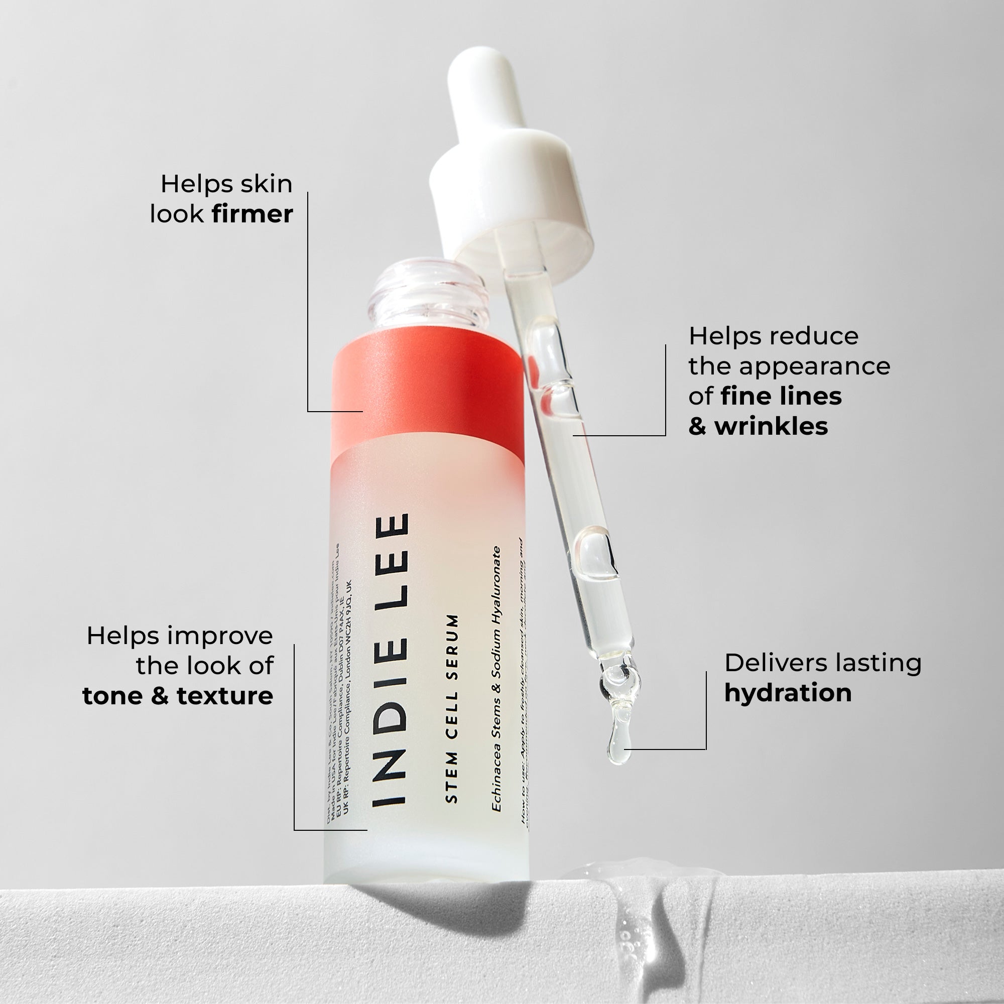 Indie Lee Stem Cell Serum bottle with dropper on a light gray background
