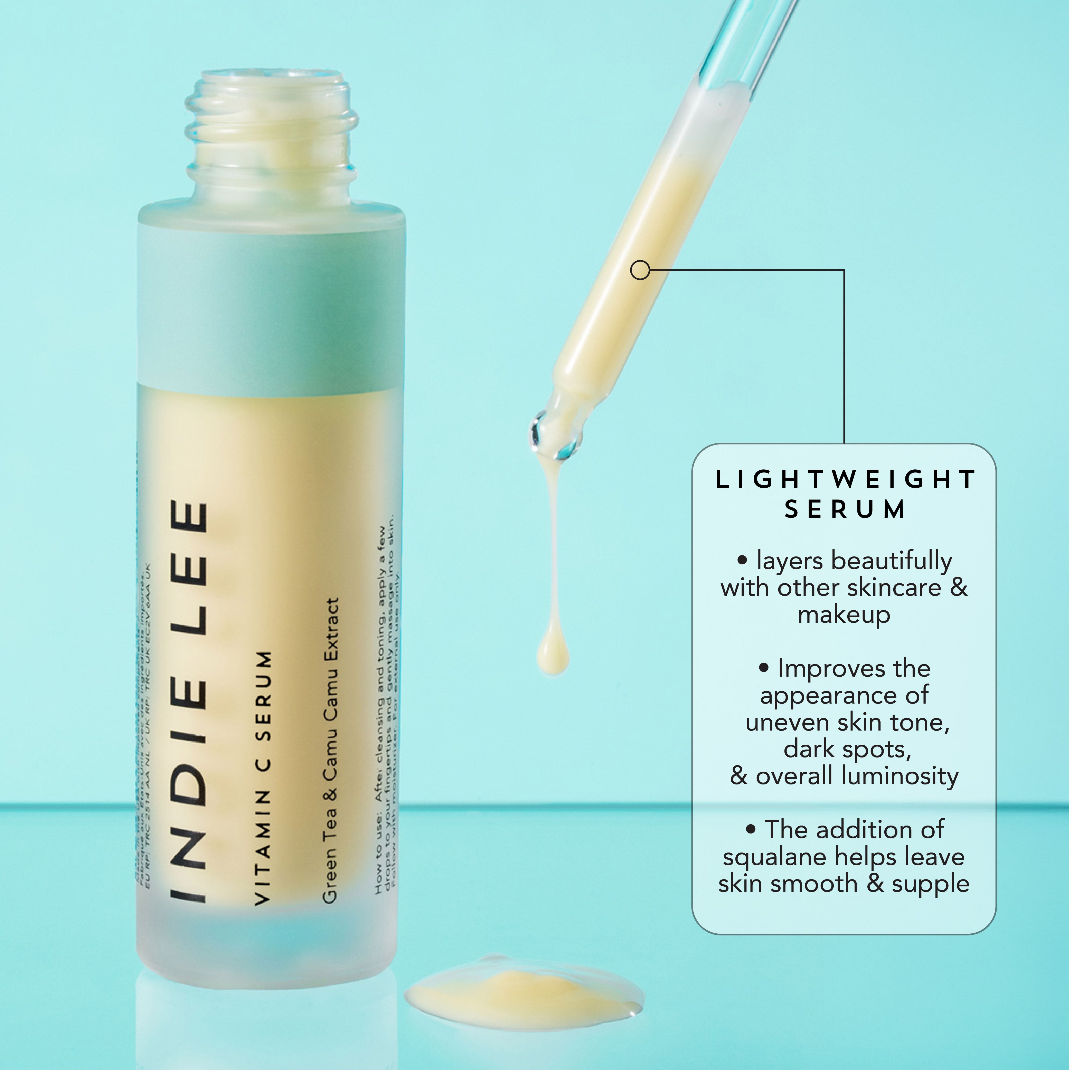 Indie Lee Vitamin C Serum with dropper on a light blue background