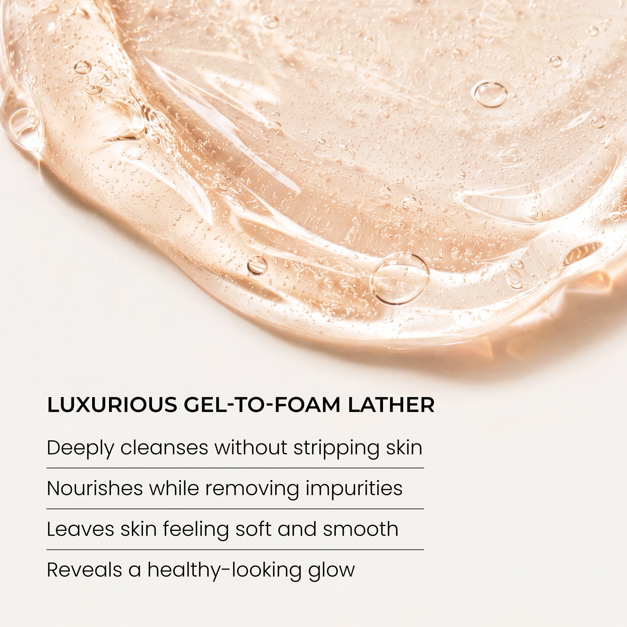 A close-up swatch of Indie Lee Brightening Cleanser on a white background with text below reading 'LUXURIOUS GEL-TO-FOAM LATHER' and product benefits.