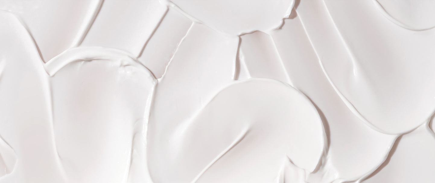 Close-up of white cream with a textured surface